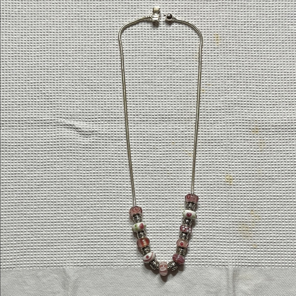 Elegant Beaded Necklace with Pink Accents